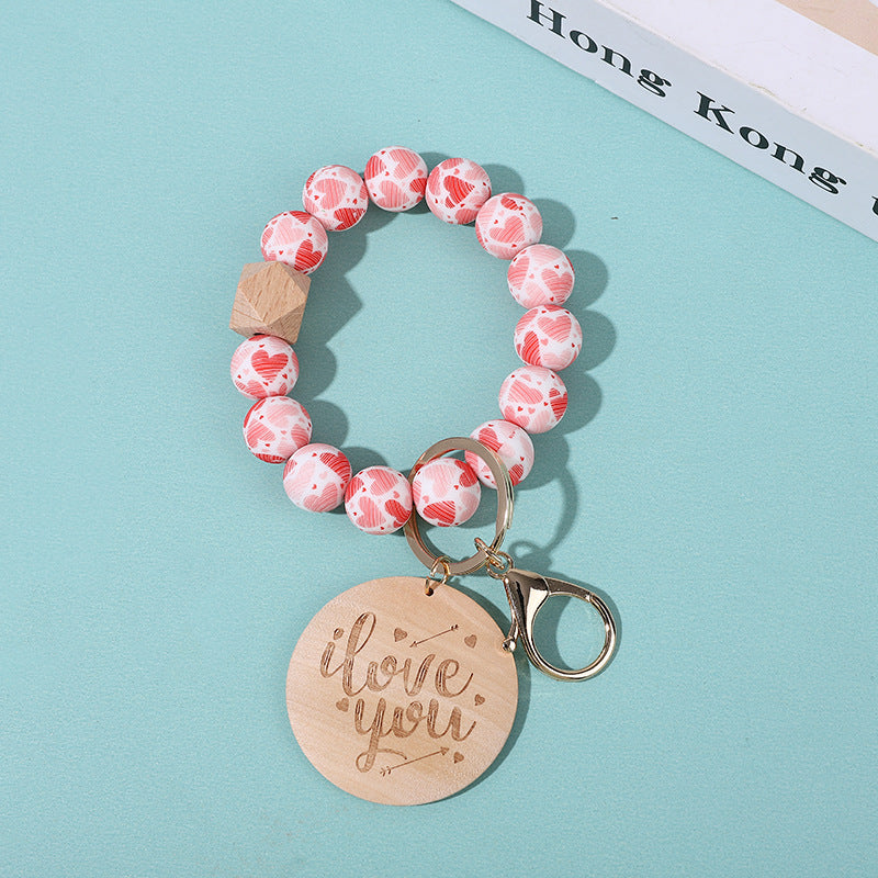 Llavero de muñeca con cuentas de silicona con impresión de borlas al por mayor